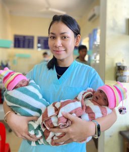Nurse with premature twins